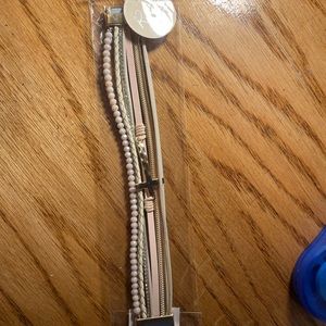 Mental cross clasp bracelet